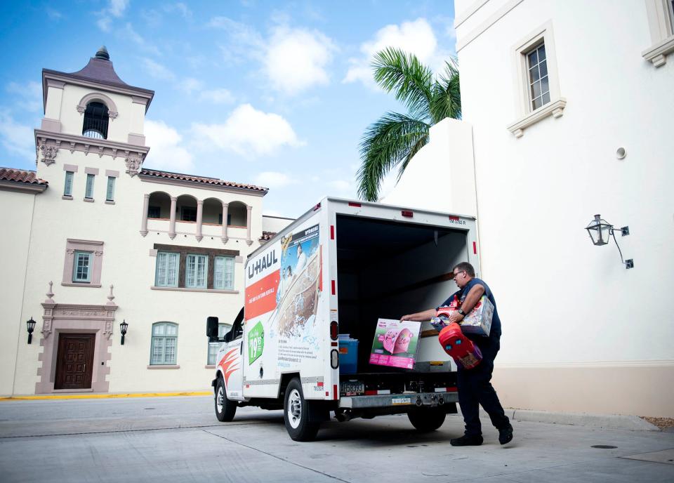 Palm Beach Fire Rescue driver Craig Johnson packs up toys to be delivered to Opportunity Early Childhood Education Thursday at Palm Beach Fire-Rescue Station No. 1.
