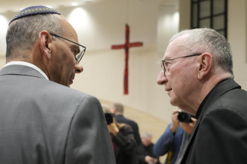 Vatican Secretary of State Pietro Parolin, talks with Rabbi Noam Marans of the American Jewish Committee, during the international conference "New documents from the Pontificate of Pope Pius XII and their Meaning for Jewish-Christian Relations: A Dialogue Between Historians and Theologians", at the Gregorian University in Rome, Monday, Oct. 9, 2023. (AP Photo/Gregorio Borgia)