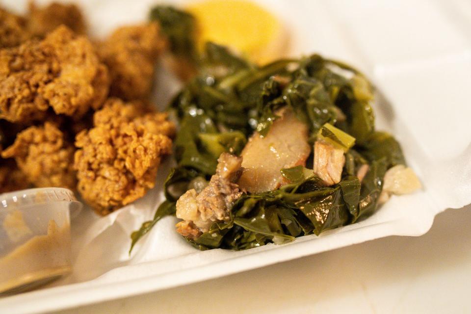 Crispy fried chicken gizzards served with pineapple-rum mustard, collards seasoned with Virginia cured pork jowl and sweet potato cornbread made by Josmine Evans of Indigo Culinary during a popup at Two Birds in Detroit's west village neighborhood on January 27, 2023.