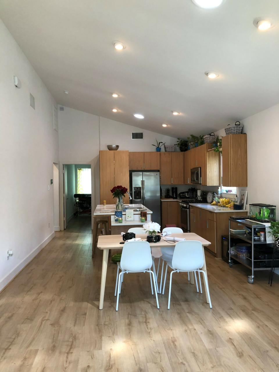 In this Wednesday, June 12, 2019 photo, shows the kitchen and dining area of Scenacia Jones' home in Houston, constructed as part of an innovative program that builds houses after natural disasters. The housing program, known as Rapido, Spanish for fast, uses pre-built materials to construct a core structure the size of mobile home and lets families live in this core while the rest of the house is completed. The first such home built in Houston debuted this week. Groups behind the program are hoping a bill signed this week by Texas Gov. Greg Abbott related to disaster planning will boost their efforts. (AP Photo/Juan Lozano)