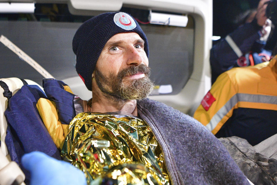 American researcher Mark Dickey is carried in a stretcher after being pulled out of Morca cave near Anamur, south Turkey, on early Tuesday, Sept. 12, 2023, more than a week after he became seriously ill 1,000 meters (more than 3,000 feet) below its entrance. Teams from across Europe had rushed to Morca cave in southern Turkey's Taurus Mountains to aid Dickey, a 40-year-old experienced caver who became seriously ill on Sept. 2 with stomach bleeding. (Mert Gokhan Koc/Dia Images via AP)