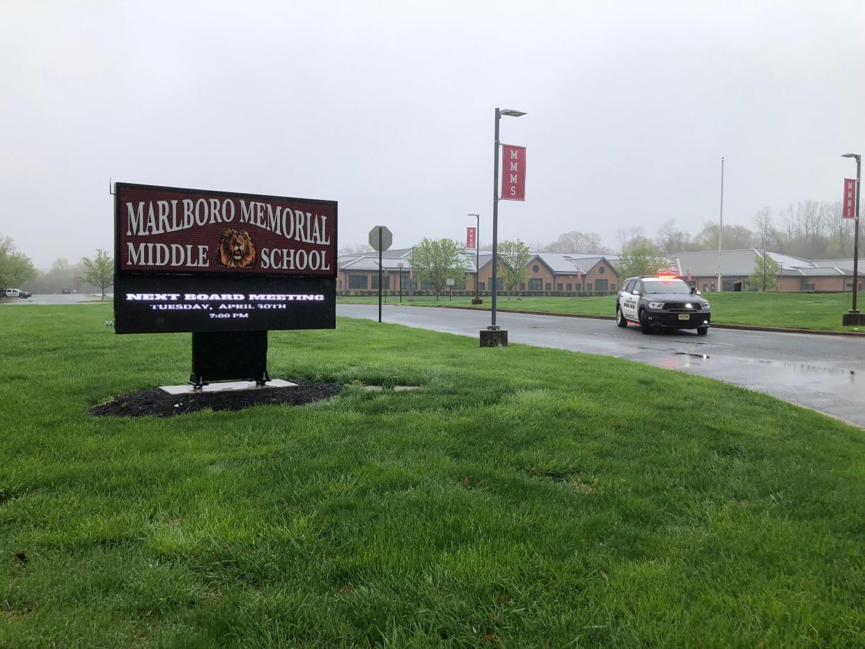 A police car sits in front of the Marlboro Memorial Middle School after a bomb threat on Thursday morning April 18,2024