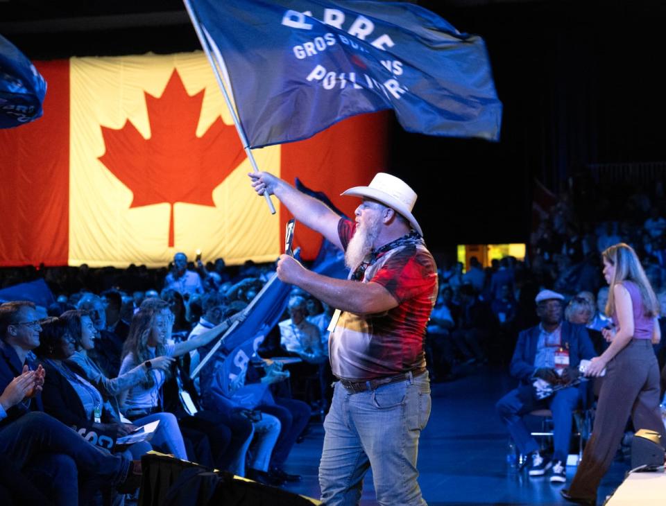 Conservative delegate Patrick Wuori calls on the crowd prior to party leader Pierre Poilievre's speech at the Conservative Party Convention, Friday, September 8, 2023 in Quebec City.