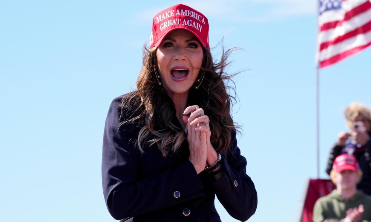 <span>Kristi Noem arrives onstage at a campaign rally for Donald Trump on 16 March 2024 in Vandalia, Ohio.</span><span>Photograph: Jeff Dean/AP</span>