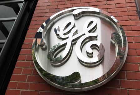 FILE PHOTO: The General Electric Co. logo is seen on the company's corporate headquarters building in Boston