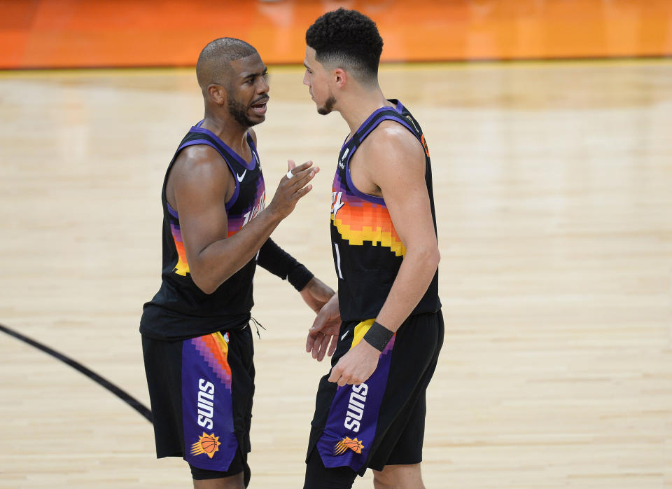 Phoenix Suns guards Chris Paul and Devin Booker during the second half of Game 1 of the 2021 NBA Finals at Phoenix Suns Arena in Phoenix on July 6, 2021. (Joe Camporeale/USA TODAY Sports)