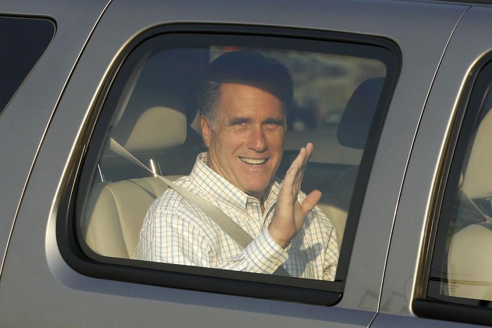 Republican Presidential candidate Mitt Romney waves as he arrives at the Utah Olympic Park for a private dinner during a donor's conference in Park City, Utah, Friday, June 22, 2012. (AP Photo/Charles Dharapak)