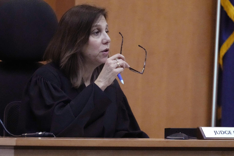 Superior Court Judge Amy Messer addresses Adam Montgomery and his defense attorneys during a sentencing hearing at Hillsborough Superior Court, Thursday, May 9, 2024, in Manchester N.H. Montgomery was found guilty of second-degree murder earlier in the year in the death of his 5-year-old daughter, Harmony, who police believe was killed nearly two years before she was reported missing in 2021 and whose body was never found. (AP Photo/Charles Krupa, Pool)