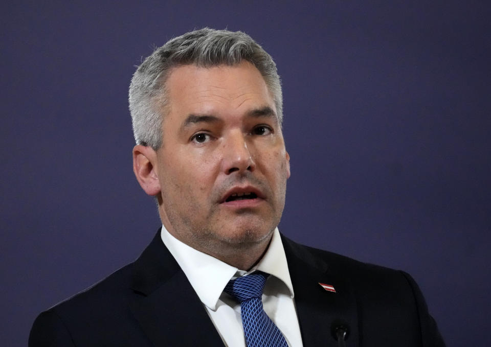 Austria's Chancellor Karl Nehammer speaks during a press conference with Serbian President Aleksandar Vucic and Hungary's Prime Minister Viktor Orban after their trilateral meeting in Belgrade, Serbia, Wednesday, Nov. 16, 2022. (AP Photo/Darko Vojinovic)