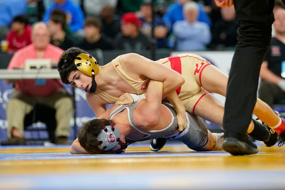 Nathan Braun of Bergen Catholic, top, wrestles Salvatore Borrometi of St. Peters Prep in the 106-pound semifinal bout on day two of the NJSIAA state wrestling tournament in Atlantic City on Friday, March 3, 2023.