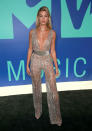 <p>For the MTV VMAs, Hailey Baldwin pulled out all the sartorial stops. The 20-year-old donned a sheer Zuhair Murad jumpsuit for the first half of the evening.<br><br>She accessorised the flared look with a belt and supersized hoops. <em>[Photo: Getty]</em> </p>