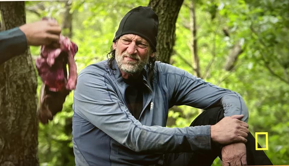 Troy Kotsur sizes up dinner on 'Running Wild with Bear Grylls: The Challenge.'