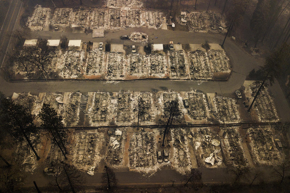 FILE - in this Nov. 15, 2018, file photo, residences were leveled by the wildfire in Paradise, Calif. World leaders have been trying to do something about climate change for 29 years but in that time Earth has gotten much hotter and more dangerous. (AP Photo/Noah Berger, File)