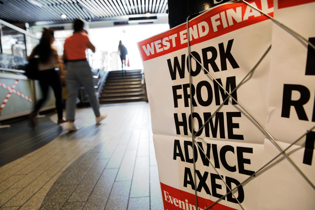 An advertising board for the Evening Standard newspaper carries the hadline 'work from home advice axed' in London on July 17, 2020. - Boris Johnson said on July 17 he hoped Britain would "return to normality" by November despite being badly affected by the coronavirus and predictions of a second wave of cases during winter months. Johnson sketched out a timetable for easing the remaining lockdown measures in England, including lifting homeworking guidance and reopening sports stadiums and live theatre. (Photo by Tolga AKMEN / AFP) (Photo by TOLGA AKMEN/AFP via Getty Images)