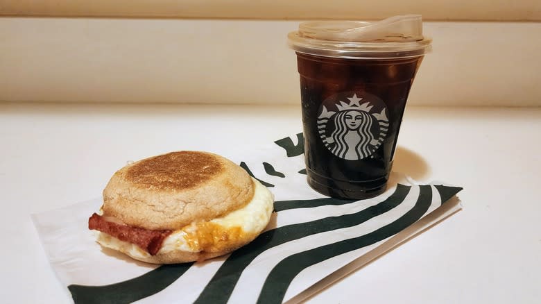 Starbucks coffee and breakfast sandwich