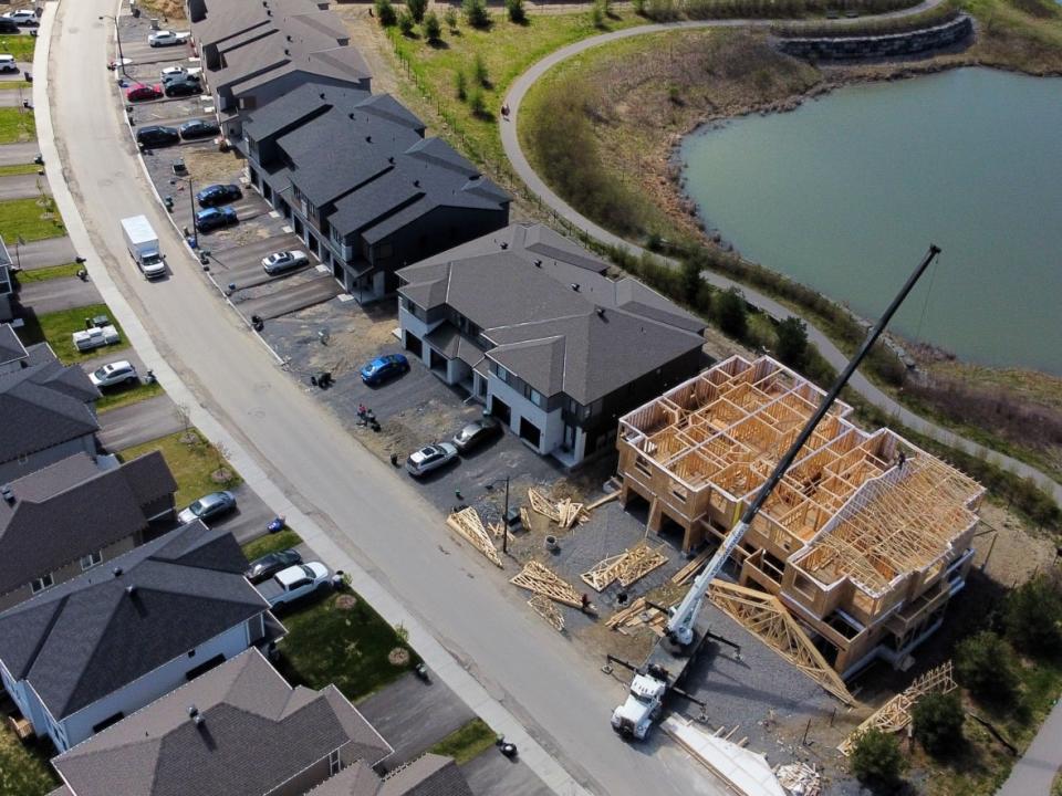 Housing is seen under construction Kanata in 2021. The Ontario government has assigned more lands for future development at the periphery of the suburbs than city council previously envisioned. (Sean Kilpatrick/The Canadian Press - image credit)