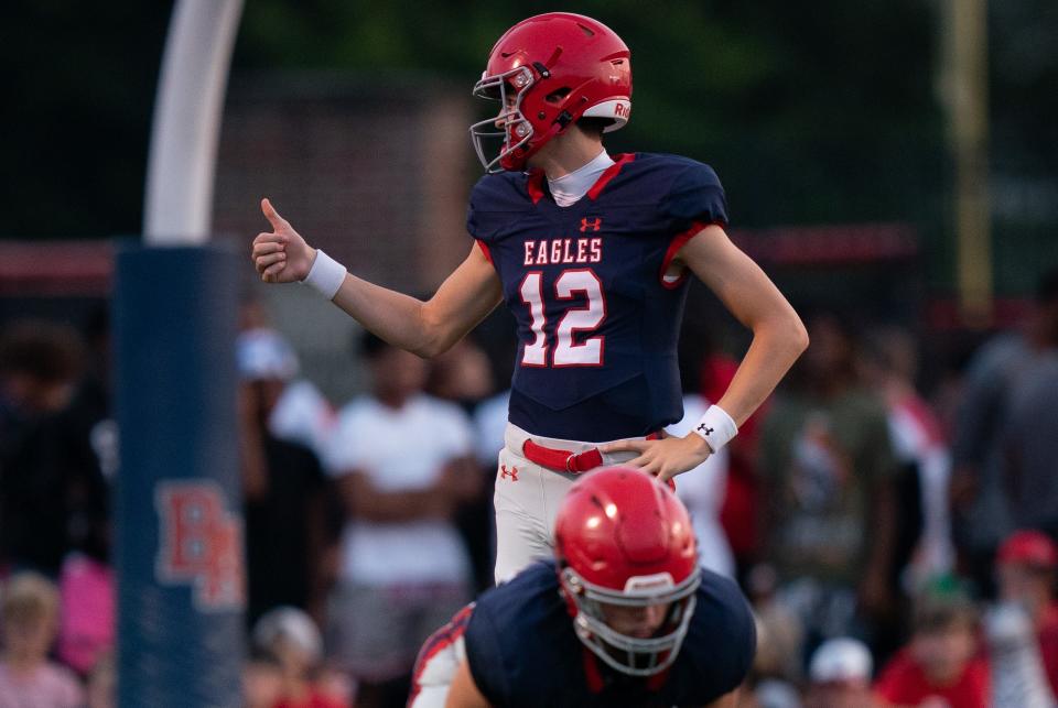 Brentwood Academy's George MacIntyre (12) readies his offense against CPA at Brentwood Academy in Nashville, Tenn., Saturday night, Aug. 19, 2023.