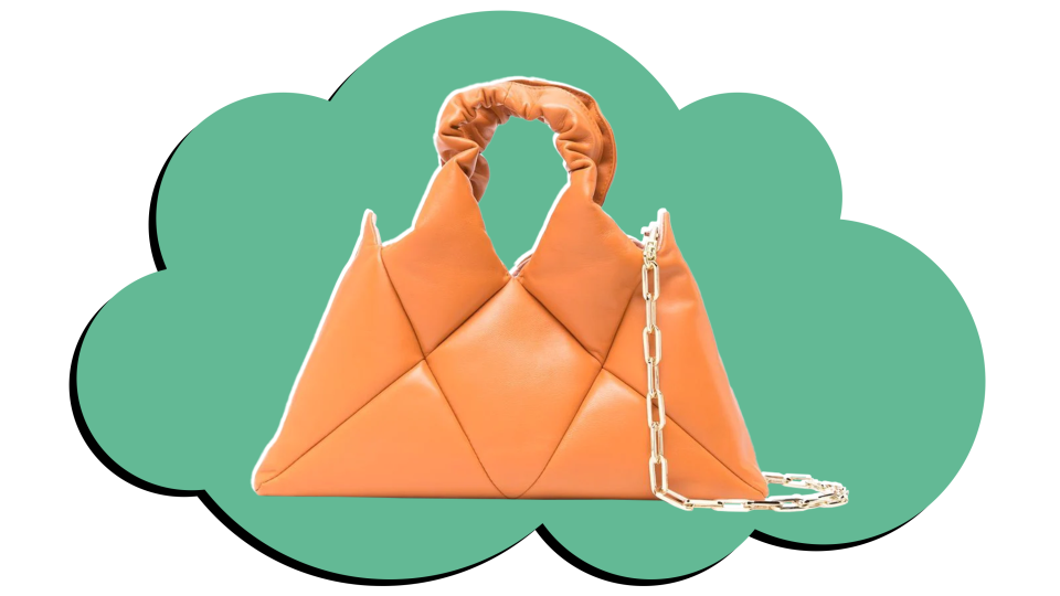 The unexpected padding and shape makes this bag a unique statement.