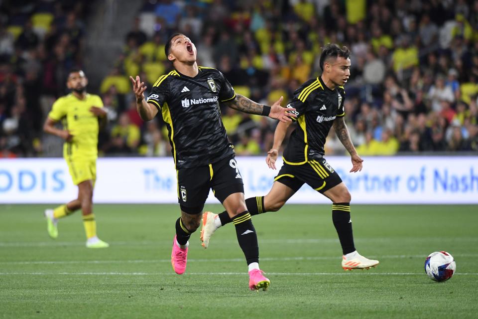 May 28, 2023; Nashville, Tennessee, USA; Columbus Crew forward Cucho Hernandez (9) reacts after being stopped for a foul during the first half at Geodis Park. Mandatory Credit: Christopher Hanewinckel-USA TODAY Sports