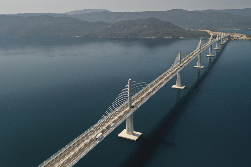 An aerial view of the newly built Peljesac Bridge in Komarna, southern Croatia, Tuesday, July 26, 2022. Croatia is marking the opening of a key and long-awaited bridge connecting two parts of the country's Adriatic Sea coastline while bypassing a small part of Bosnia's territory. (AP Photo)