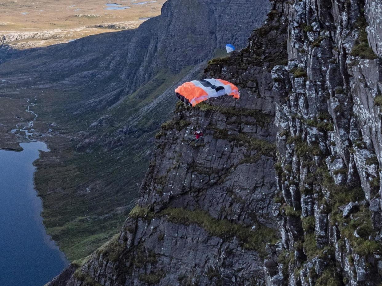 Sam Percival escaped with a sprained wrist and ankle after tumbling 180ft down a mountain: Dave Gallagher / SWNS.com