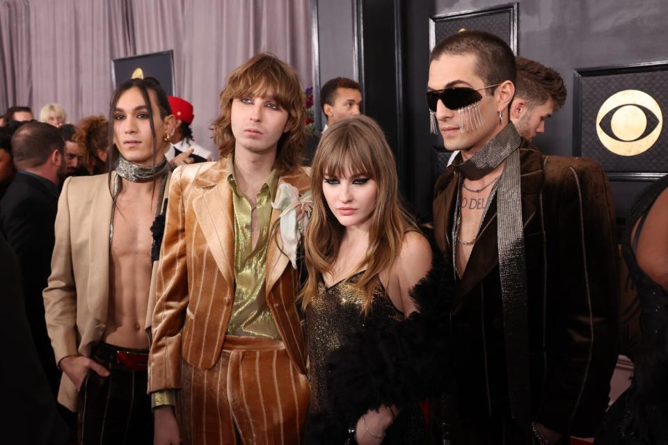 Ethan Torchio, Thomas Raggi, Victoria De Angelis, and Damiano David of Maneskin attend the show.