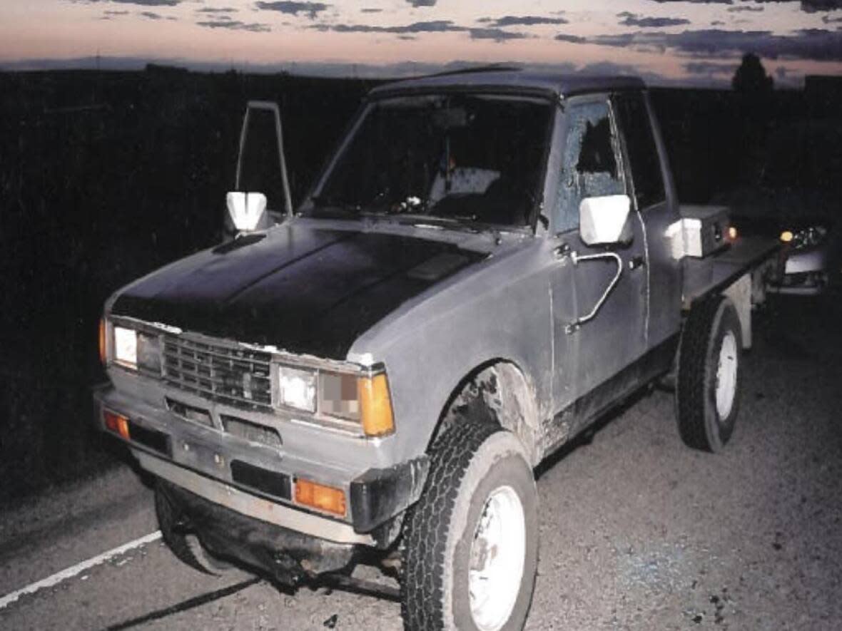 Nick Maradyn was fatally shot as he sat in the driver's seat of his truck. He had received a call from his estranged wife's phone that night which brought him to a remote area near Crossfield. The image shows the passenger window rolled down and his driver's window shattered from the bullet that first struck the victim. (Court exhibit - image credit)