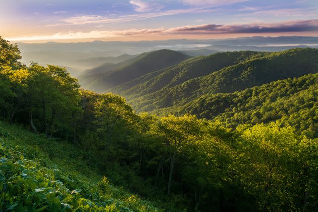 The sun rises over the Appalachian Mountains near Mt. Pisgah, about two hours west of Gaston County. (Photo: Teresa Kopec via Getty Images)