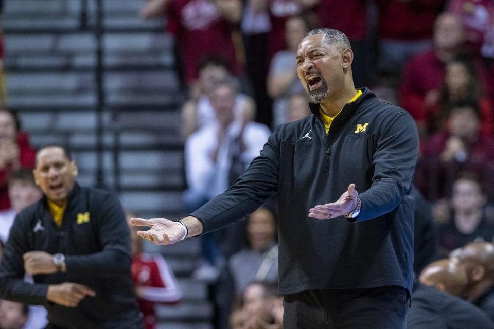 Michigan head coach Juwan Howard reacts to play on the court during the first half of an NCAA college basketball game against Indiana, Sunday, March 5, 2023, in Bloomington, Ind. (AP Photo/Doug McSchooler)