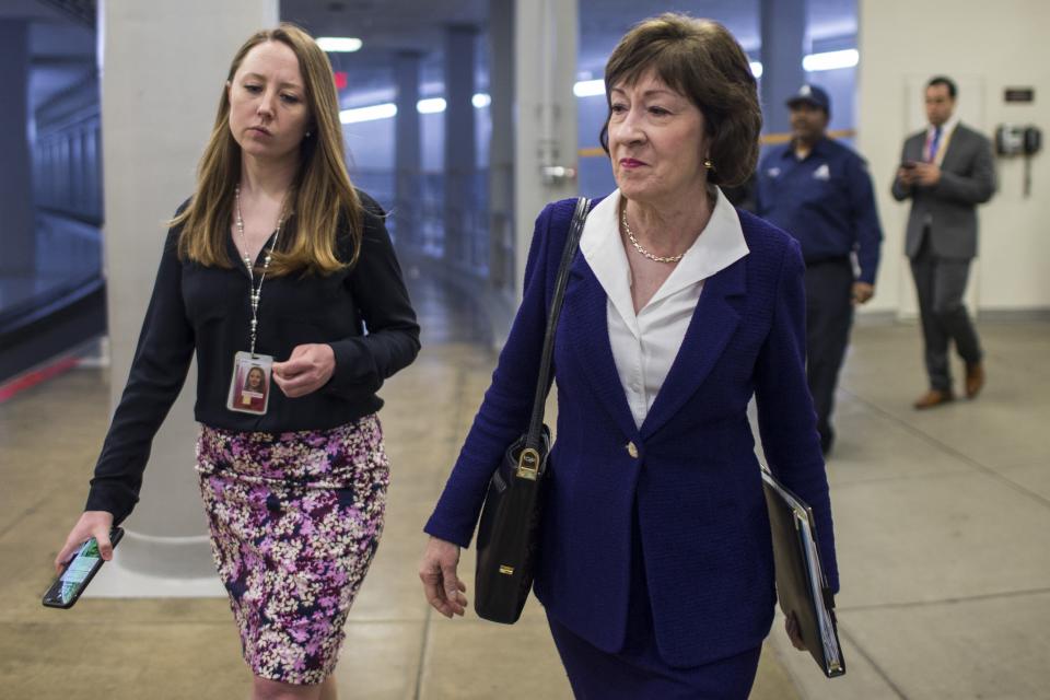 Sen. Susan Collins, R-Maine, walks through the Senate basement before a weekly policy luncheon on April 2, 2019 in Washington.