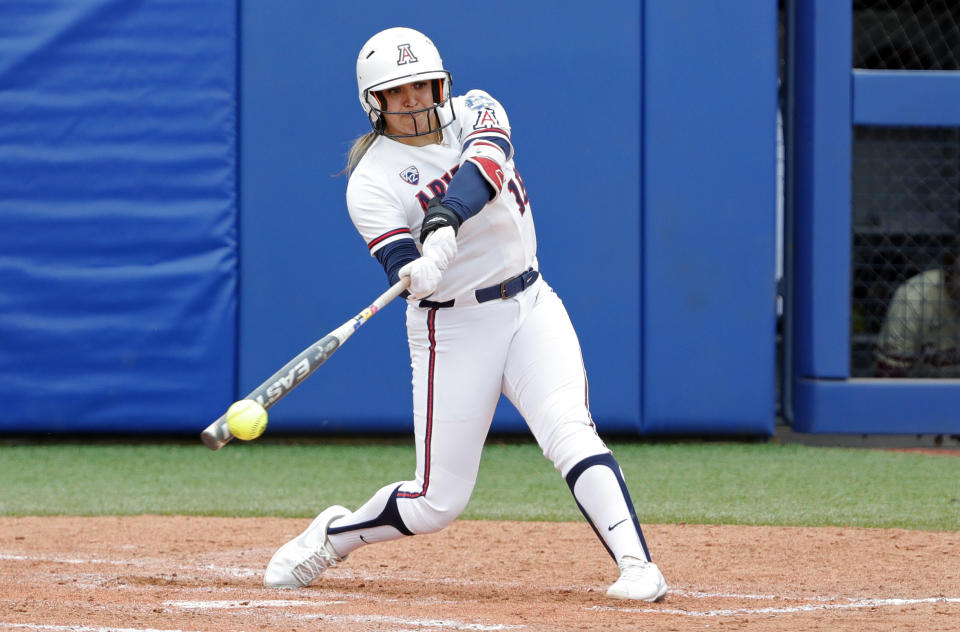 Arizona's Sharlize Palacios (18) gets a hit in the fifth inning of an NCAA Women's College World Series softball game against Florida State, Saturday, June 5, 2021, in Oklahoma City. (AP Photo/Alonzo Adams)