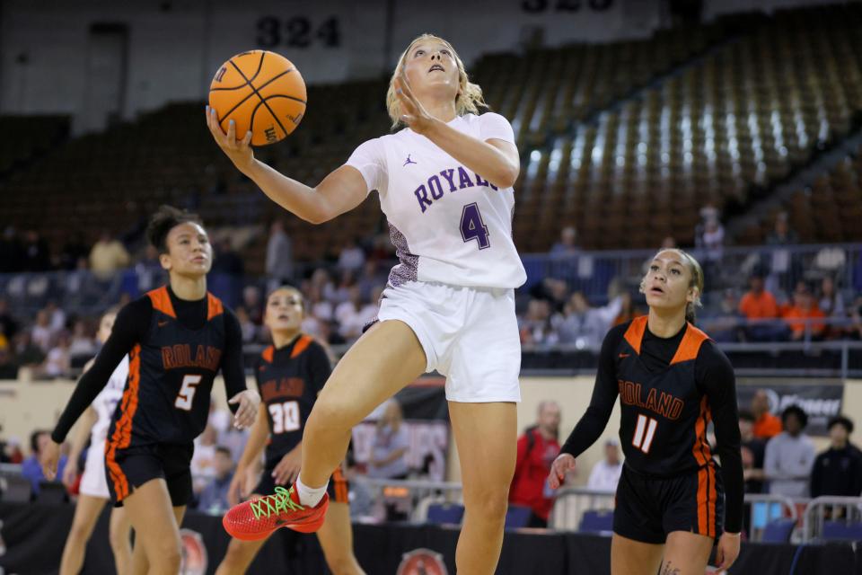 Community Christian's Laney Venables makes a basket during a Class 3A girls basketball quarterfinal game against Roland on Tuesday at State Fair Arena.