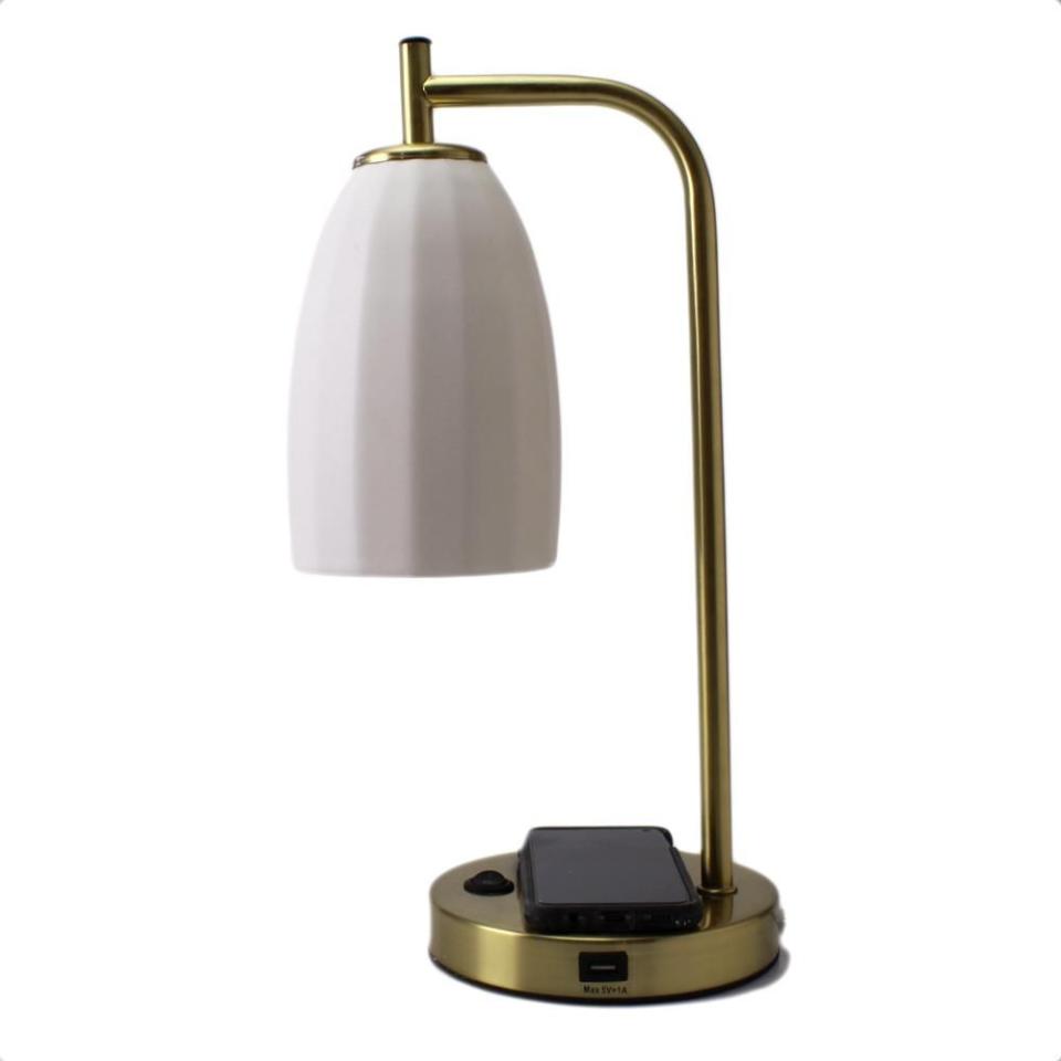 <p><strong>3 reviews</strong></p><p>thebrightangle.com</p><p><strong>$200.00</strong></p><p><a href="https://thebrightangle.com/products/modern-table-lamp-with-vintage-porcelain-shade" rel="nofollow noopener" target="_blank" data-ylk="slk:Shop Now;elm:context_link;itc:0;sec:content-canvas" class="link ">Shop Now</a></p>