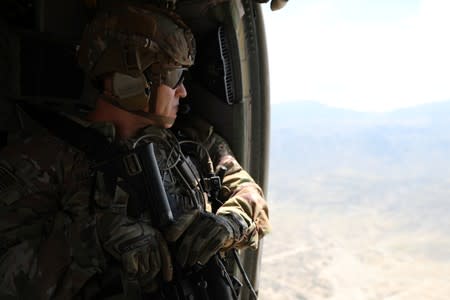An advisor from the 2nd Security Force Assistance Brigade flies during their deployment to Afghanistan
