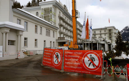 A sign reads "No trespassing" in front of the Steigenberger Belvedere hotel in the Swiss mountain resort of Davos, Switzerland, January 11, 2018 REUTERS/Arnd Wiegmann