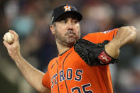 Houston Astros starting pitcher Justin Verlander throws against the Texas Rangers during the first inning in Game 5 of the baseball American League Championship Series Friday, Oct. 20, 2023, in Arlington, Texas. (AP Photo/Julio Cortez)