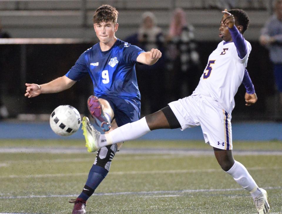 McDowell High School senior Carter Swanson, left, and Erie High senior Bashir Kapamba compete duing a soccer game at Gus Anderson Field in Millcreek Township on Oct. 3, 2023.