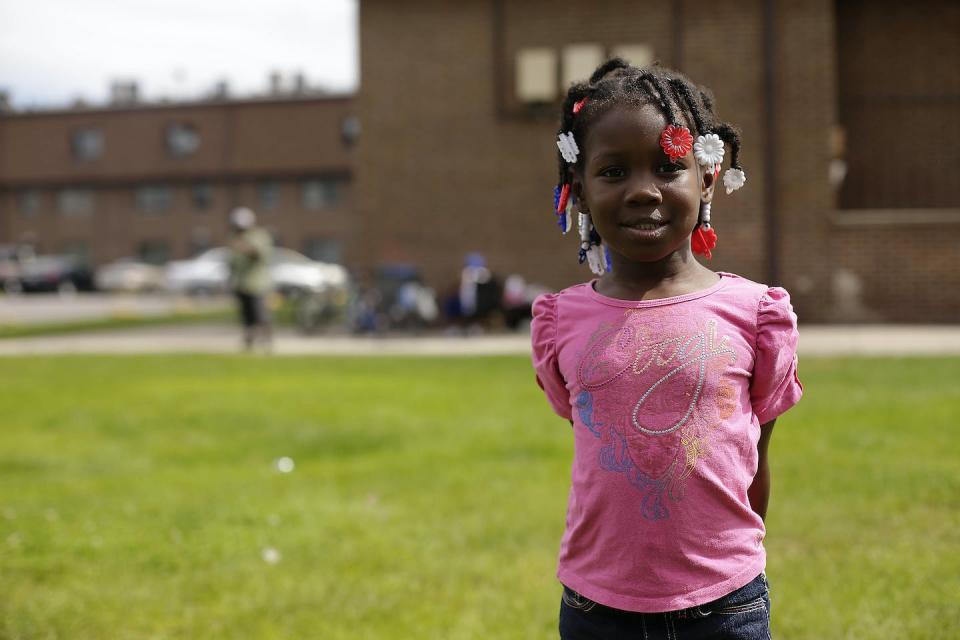 Kaelynn Lott, one of 120 children living at the West Calumet Housing Complex in East Chicago, Indiana, who tested positive for lead poisoning. After soil at the complex was found to contain high levels of lead and arsenic in 2016, the city ordered over 1,000 residents to relocate. <a href="https://www.gettyimages.com/detail/news-photo/kaelynn-lott-a-resident-at-the-west-calumet-housing-complex-news-photo/599443064" rel="nofollow noopener" target="_blank" data-ylk="slk:Joshua Lott/Getty Images;elm:context_link;itc:0;sec:content-canvas" class="link ">Joshua Lott/Getty Images</a>