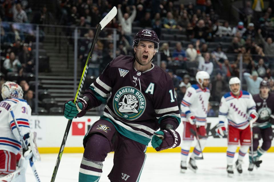 Anaheim Ducks center Adam Henrique (14) celebrates his goal during the first period of an NHL hockey game against the New York Rangers, Sunday, Jan. 21, 2024, in Anaheim, Calif.