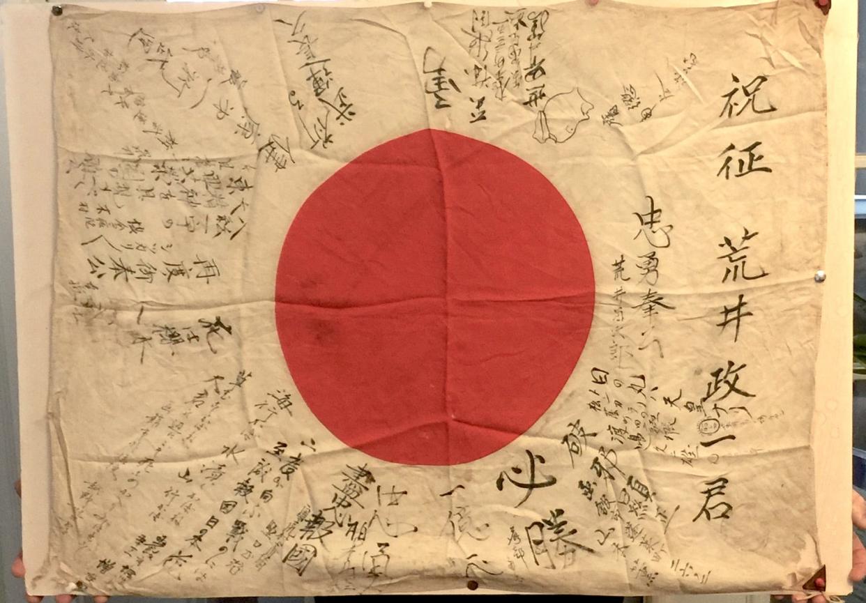 "Good luck" flags, called Yosegaki Hinomaru, were traditionally given by friends and family to Japanese servicemen heading off to war, especially during World War II. The flag was typically the national emblem, signed with short messages wishing the soldier victory, good luck and a safe return.