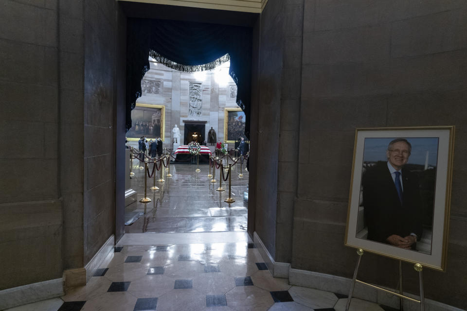 The flag-draped casket of former Senate Majority Leader Harry Reid of Nevada, lies in state in the Rotunda of the U.S Capitol, Wednesday, Jan. 12, 2022, in Washington. (AP Photo/Alex Brandon)