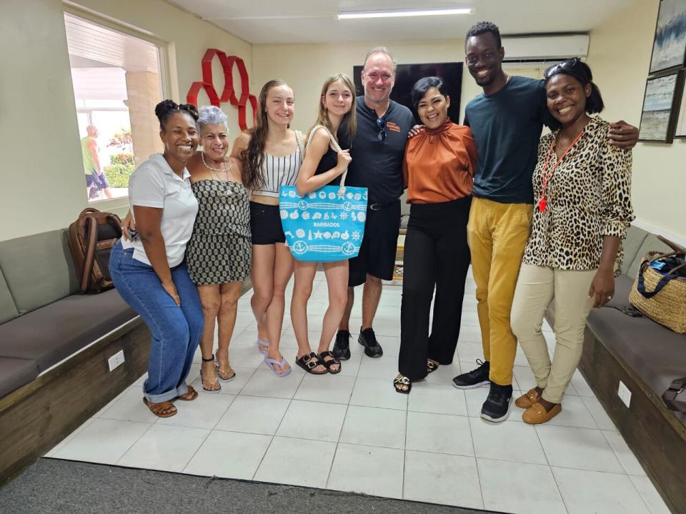 The two teens were honoured by authorities in Barbados for swimming to action and saving a drowning couple.