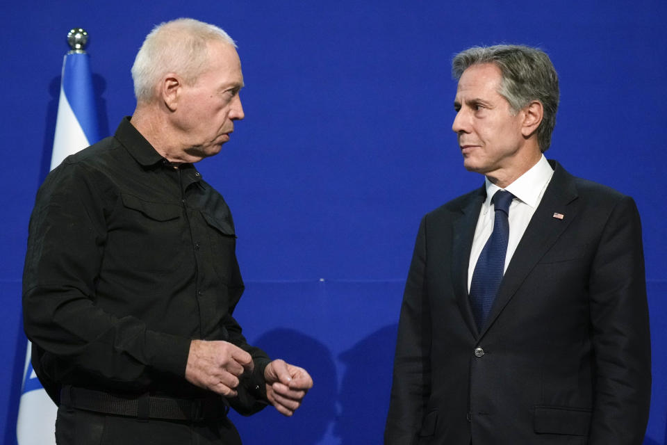 U.S. Secretary of State Antony Blinken, right, listens as Israeli Defense Minister Yoav Gallant speaks at The Kirya, Israel's Ministry of Defense, Monday, Oct. 16, 2023, in Tel Aviv. (AP Photo/Jacquelyn Martin, Pool)