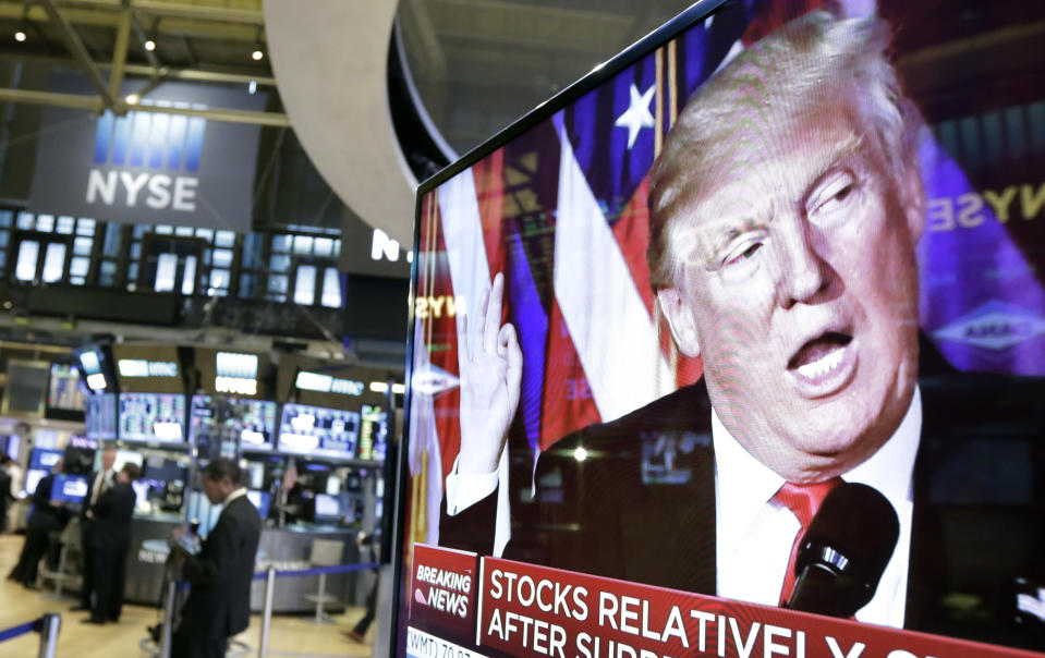 An image of President-elect Donald Trump appears on a television screen on the floor of the New York Stock Exchange. (AP Photo/Richard Drew)