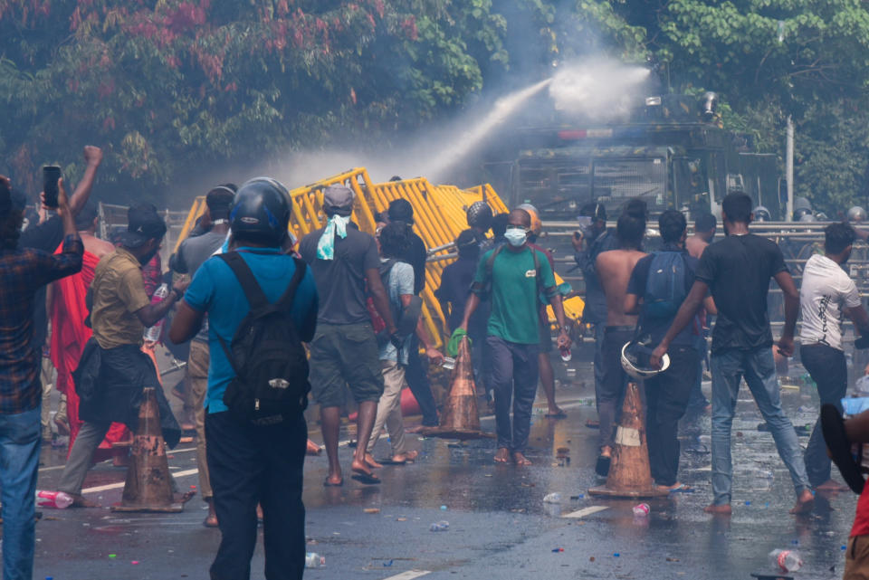 Ongoing anti-government protests against Sri Lanka's President Gotabaya Rajapaksa were met with water cannons and tear gas today on May 6, 2022 Protesters in front of Sri Lanka's parliament were met with force thrice today. (Photo by Akila Jayawardana/NurPhoto via Getty Images)