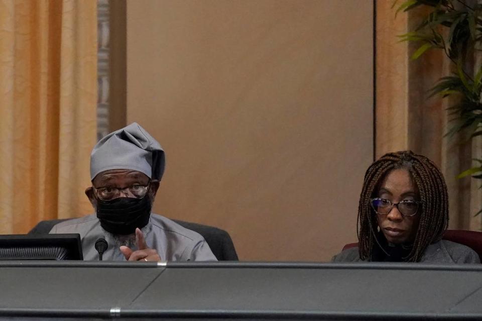 Task force vice-chair Dr. Amos Brown, left, speaks next to task force member Monica Montgomery Steppe during a meeting by the Task Force to Study and Develop Reparation Proposals for African Americans in Oakland on Wednesday. Jeff Chiu/AP