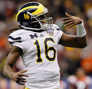 Denard Robinson’s stellar play and charisma has made him a big fan favorite in Michigan. (Getty)