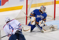 BUFFALO, NY - JANUARY 03: Taylor Hall #4 of the Edmonton Oilers scores on Ryan Miller #30 of the Buffalo Sabres in the first period at First Niagara Center on January 3, 2012 in Buffalo, New York. (Photo by Rick Stewart/Getty Images)