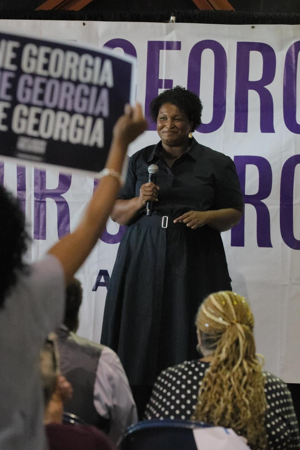 Democratic gubernatorial candidate Stacey Abrams speaks to a small audience in the lobby of the James Brown Arena on Saturday, Sept. 10, 2022.