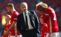 Football Soccer Britain - Leicester City v Manchester United - FA Community Shield - Wembley Stadium - 7/8/16 Manchester United manager Jose Mourinho, Marouane Fellaini and Luke Shaw before the game Reuters / Eddie Keogh Livepic EDITORIAL USE ONLY. No use with unauthorized audio, video, data, fixture lists, club/league logos or "live" services. Online in-match use limited to 45 images, no video emulation. No use in betting, games or single club/league/player publications. Please contact your account representative for further details.